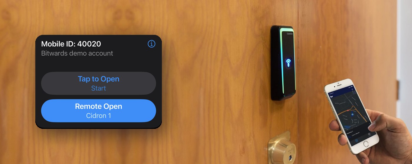 A wooden door with an access control reader on it and a phone held up beside it, with the mobile ID from the Bitwards ONE app shown alongside: the credential number, the account it belongs to, and its tap-to-open and remote-open buttons